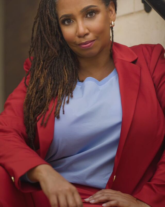 Portrait of Hedreich Nichols in a red blazer
